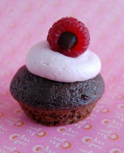 Devil’s Food Cupcakes with Raspberry Jam Buttercream and Raspberry Truffle