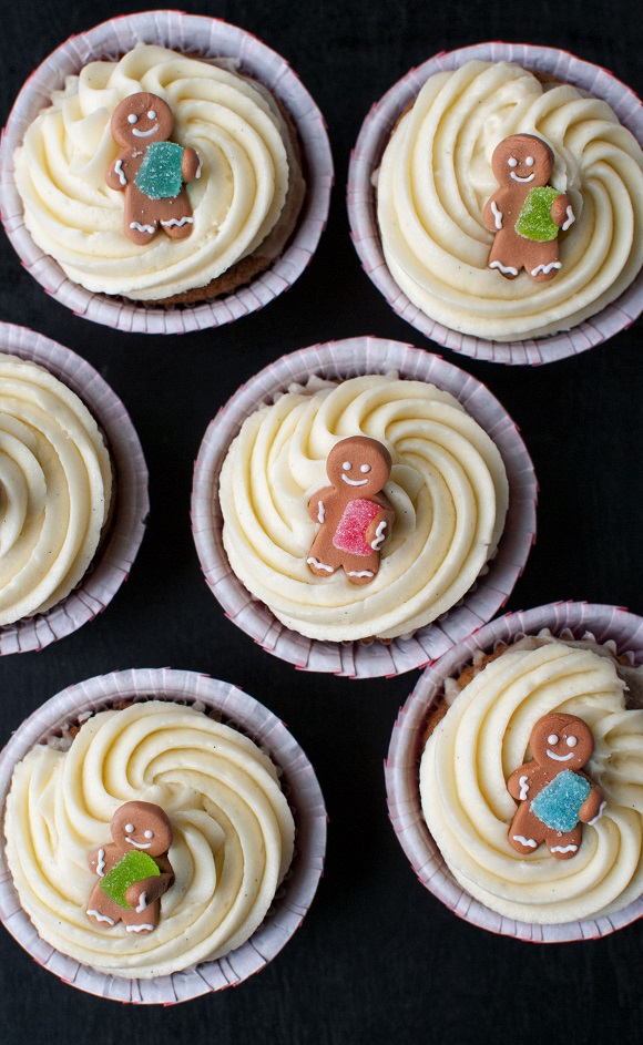 Overhead shot of Gingerbread Cupcakes with Orange Glaze and Mascarpone Buttercream