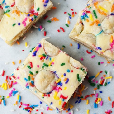 Sprinkle Sugar Cookie Cheesecake Bars