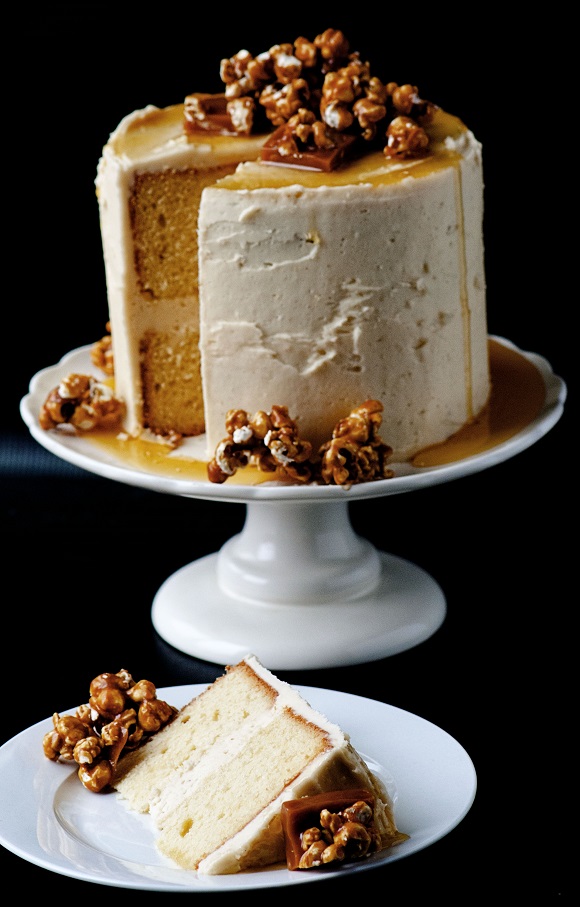 Caramel Corn Caramel Layer Cake with piece cut out.