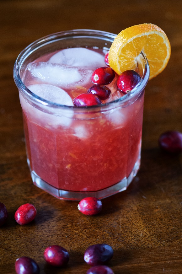 Side view of Screw-dged Cocktail Creamsicle Cranberry Screwdriver