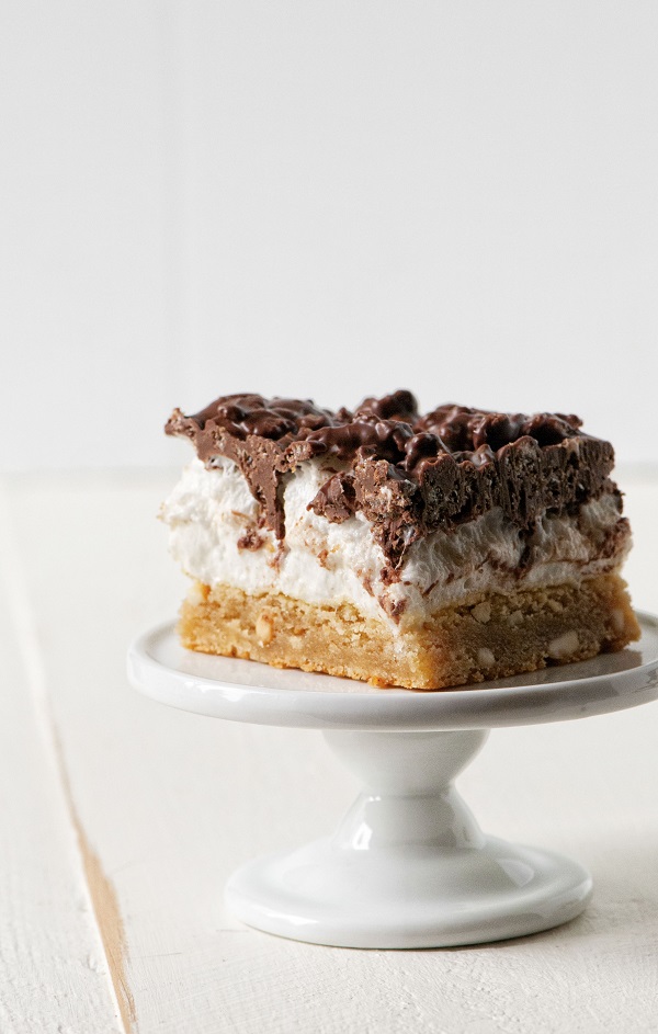 Single Peanut Butter Marshmallow Crunch Bars on a mini cake platter