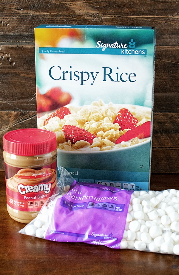 Box of Crispy Rice Cereal, creamy peanut butter, and bag of marshmallows