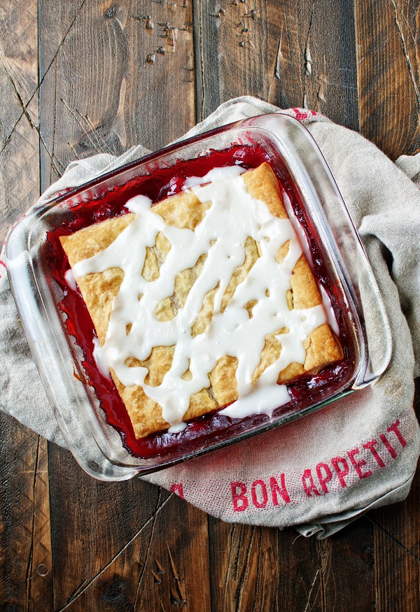 Overhead shot of the Cherry Toaster Strudel Cobbler on a brown dishtowel