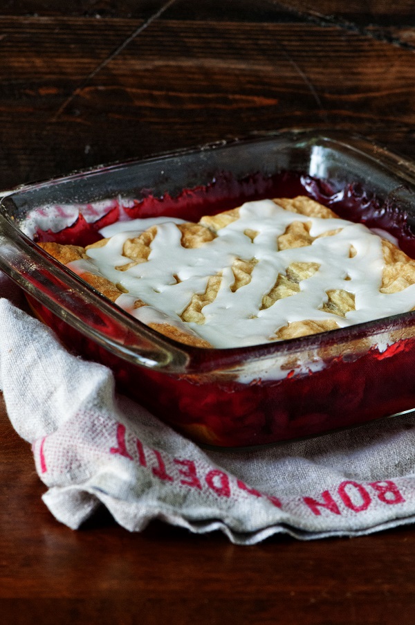 Side view of cobbler on a brown dish towel.