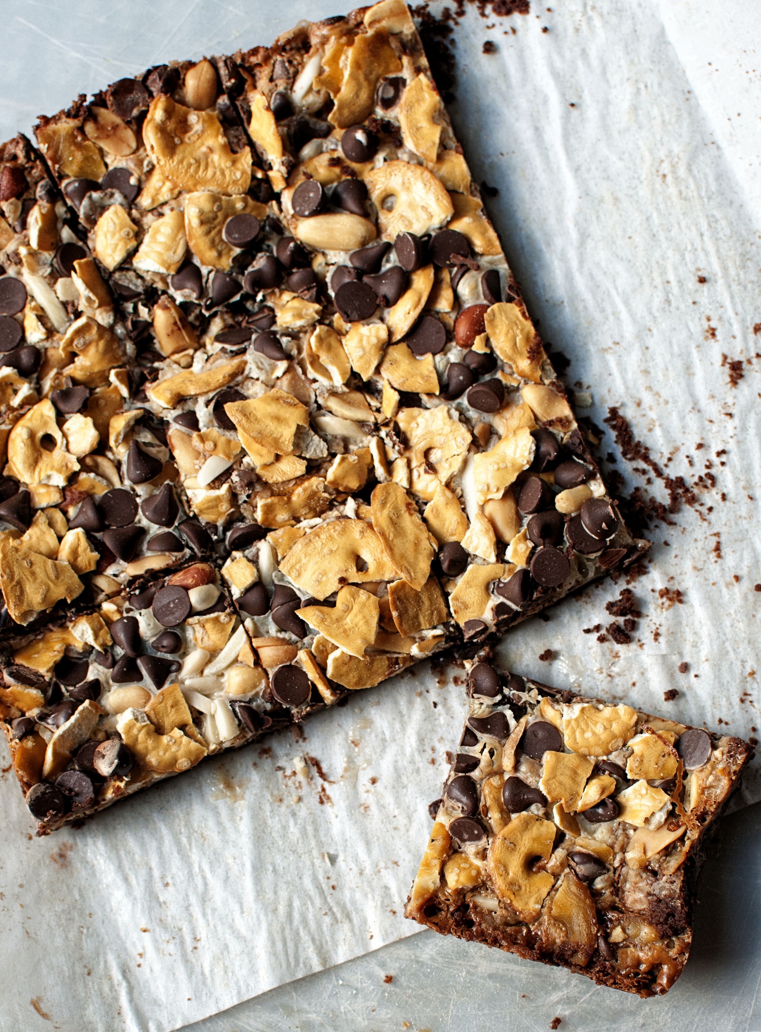 Overhead shot of Cowboy 7 Layer Cookie Bar with slice cut out. 