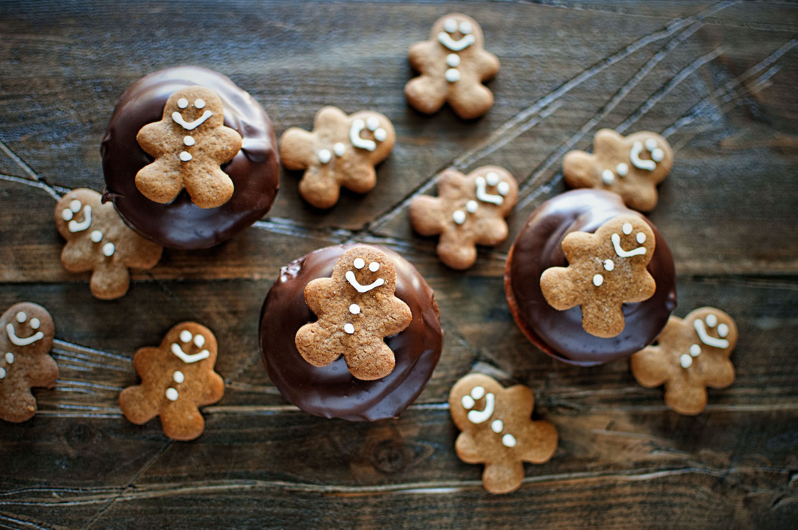 Chocolate Dipped Gingerbread Cupcakes with Orange Swiss Meringue Buttercream