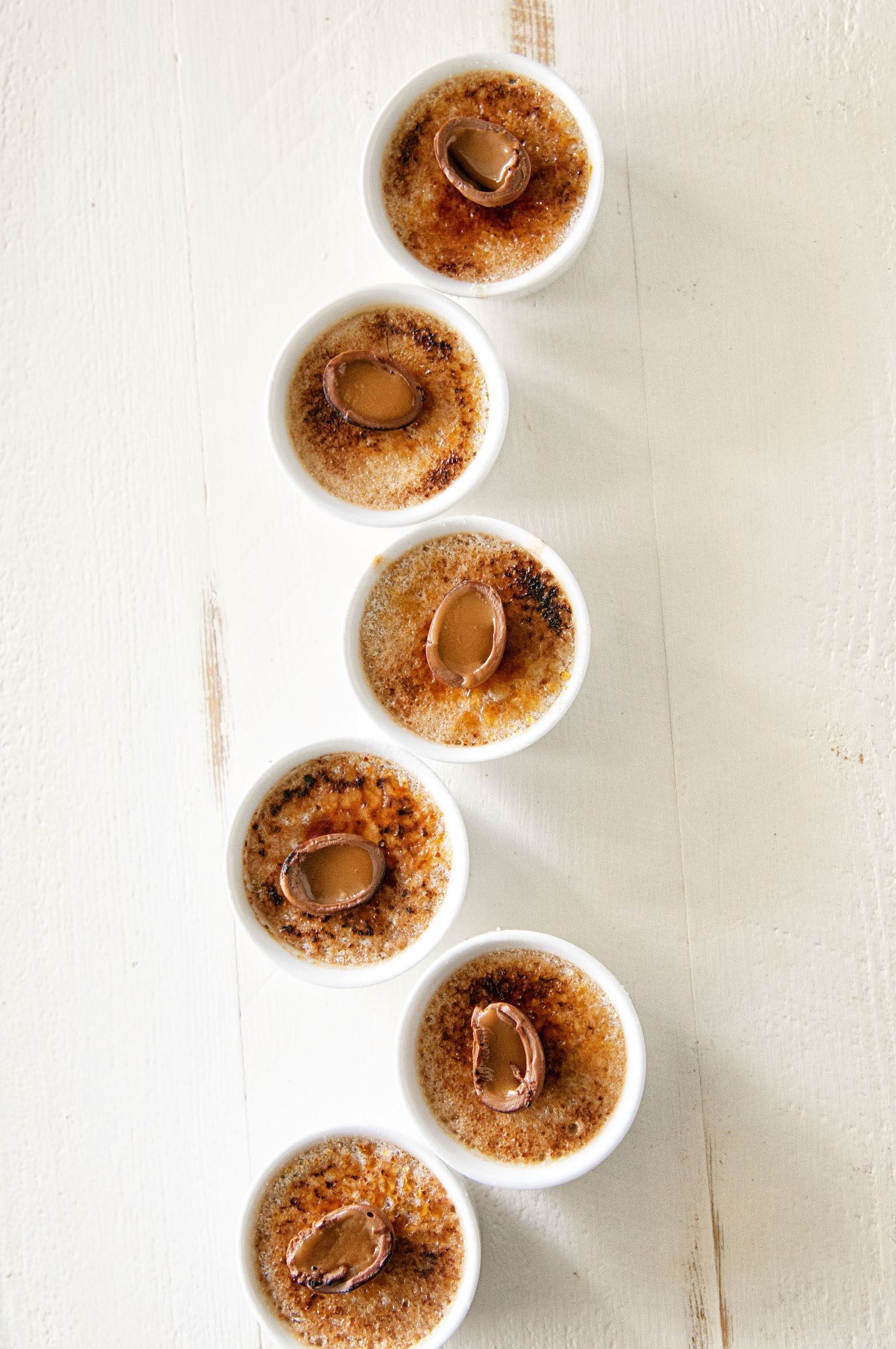 Overhead shot of 6 mini Cadbury Caramel Egg Creme Brulee