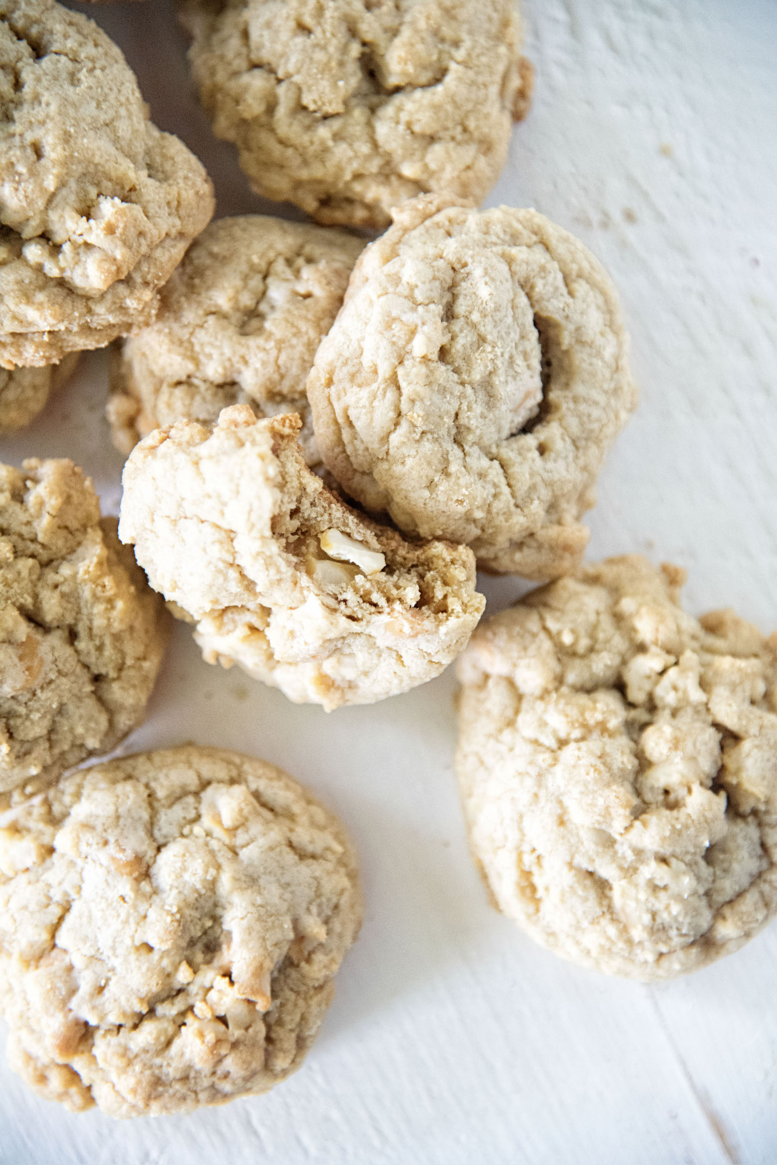 Butterscotch Salted Cashew Cookies with bite out of one.