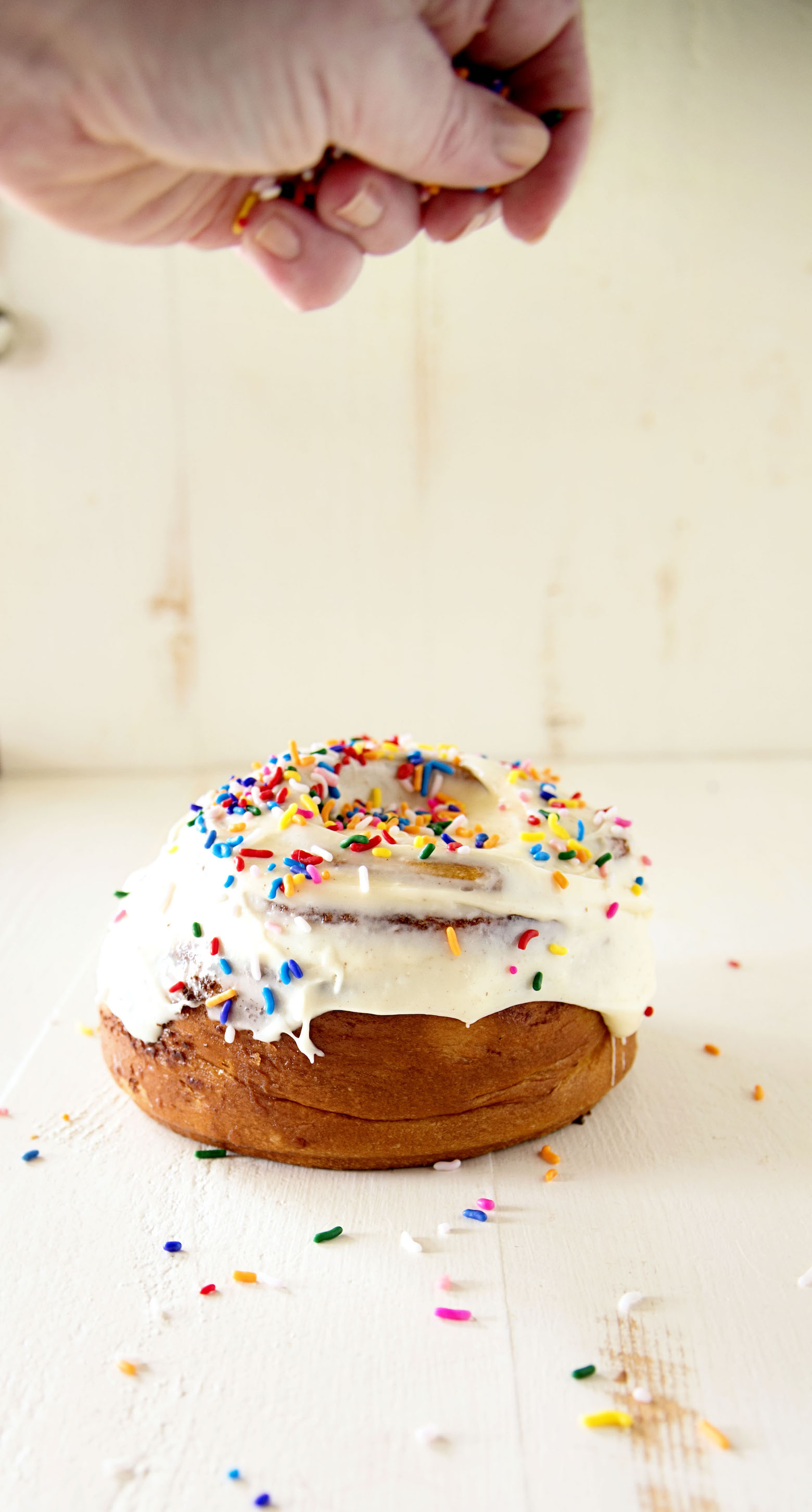 Sprinkles falling onto roll