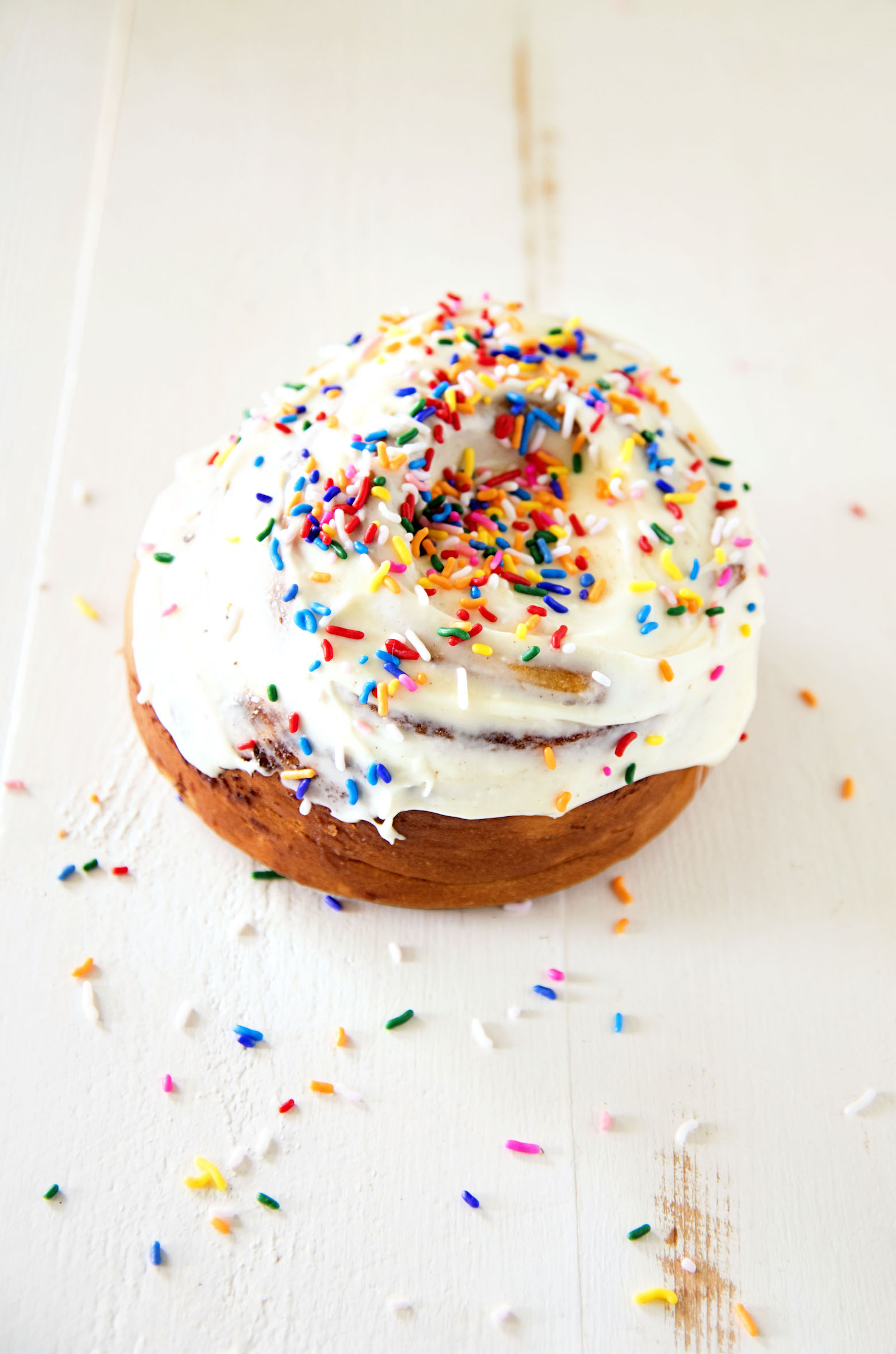 Giant Cinnamon Roll with Cake Batter Frosting