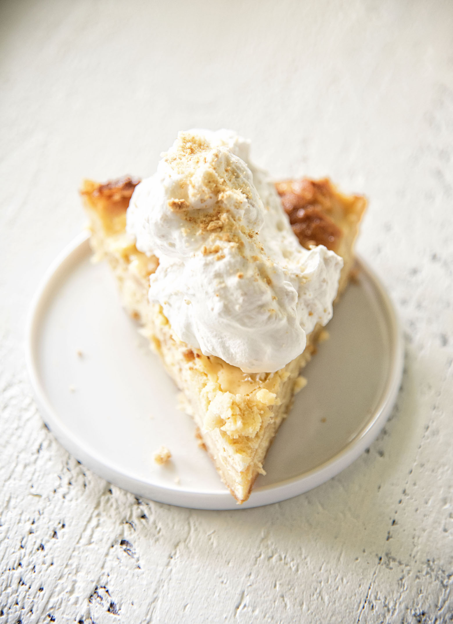 Slice of Key Lime Pie Bread Pudding on plate.