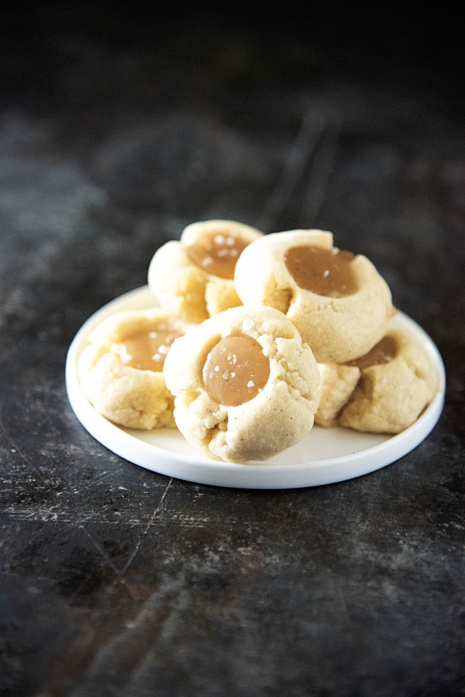 Vanilla Bean Caramel Thumbprint Cookies on a plate
