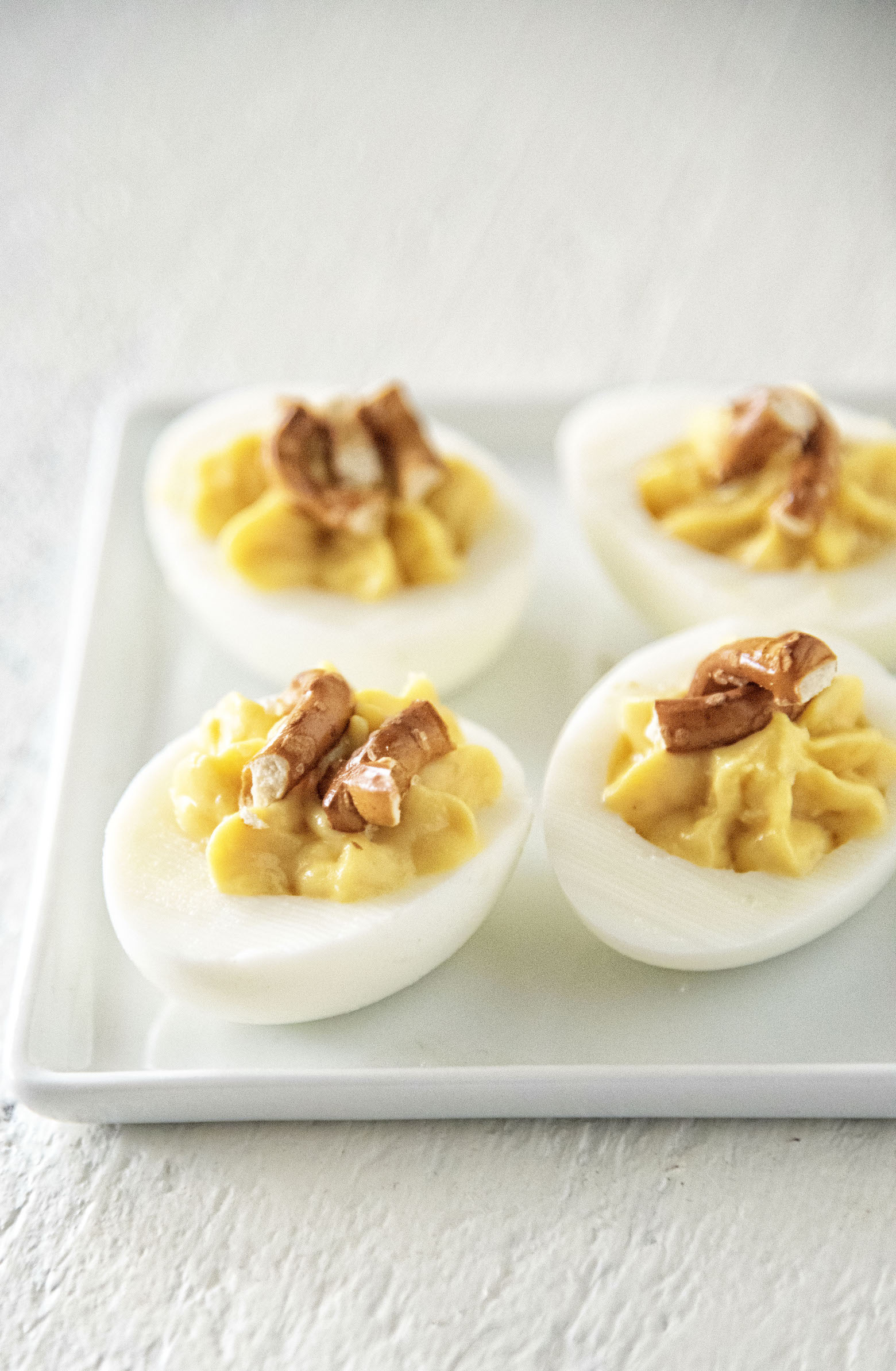 Honey Mustard Pretzel Deviled Eggs