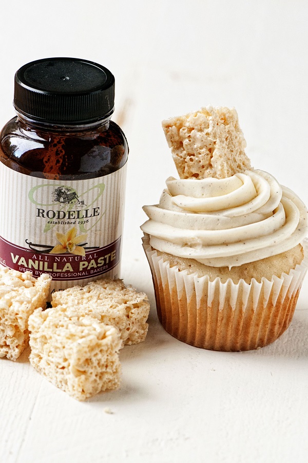 Vanilla Bean Rice Krispie Treat Cupcakes next to Rodelle Bottle 