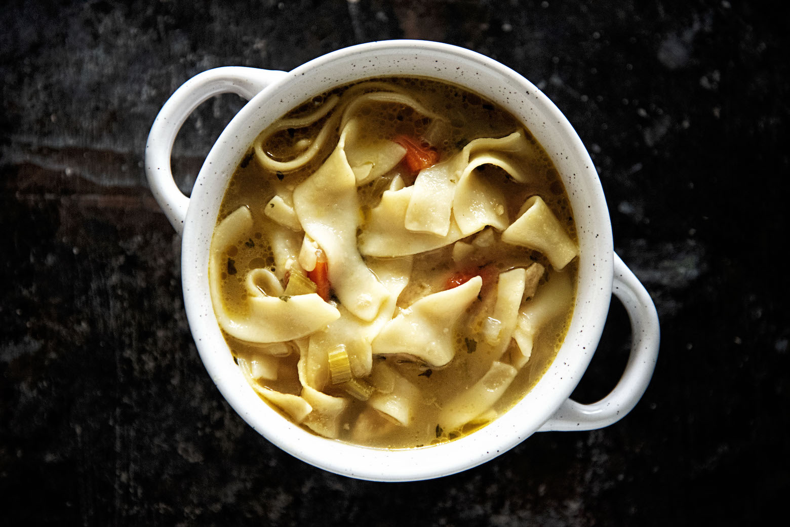 Overhead photo of a bowl of Chickenless-Chicken Noodle Soup