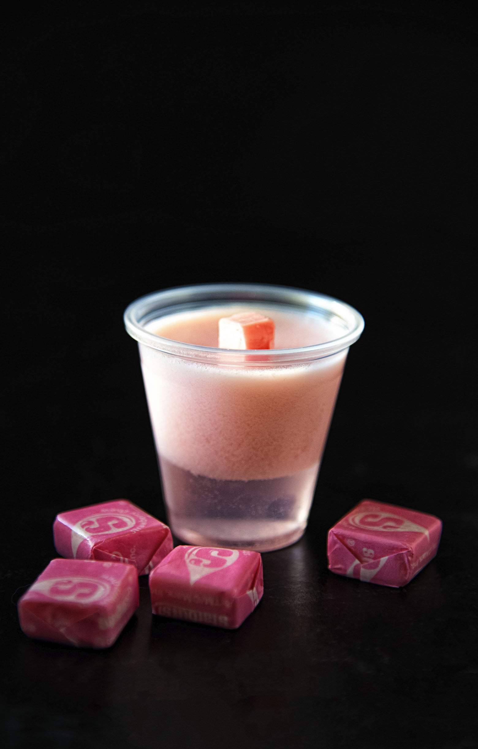 Side view of single Pink Starburst Jell-O Shot