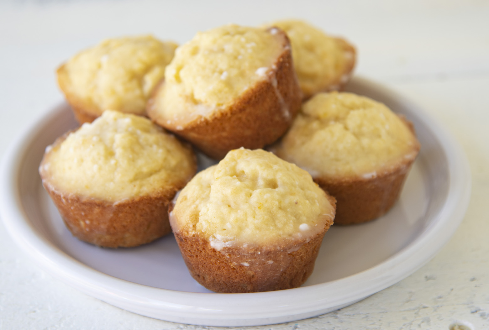 Orange Glazed Almond Muffins