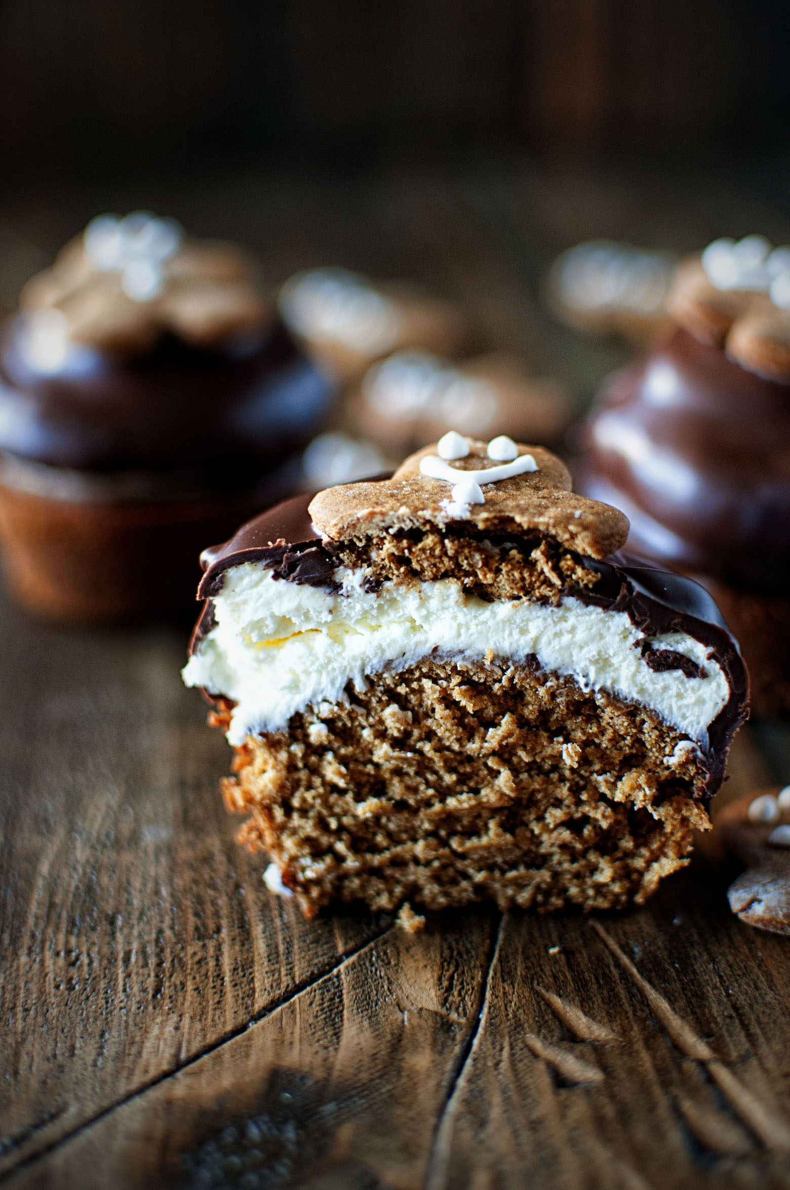 Chocolate Dipped Gingerbread Cupcake with Orange Swiss Meringue Buttercream