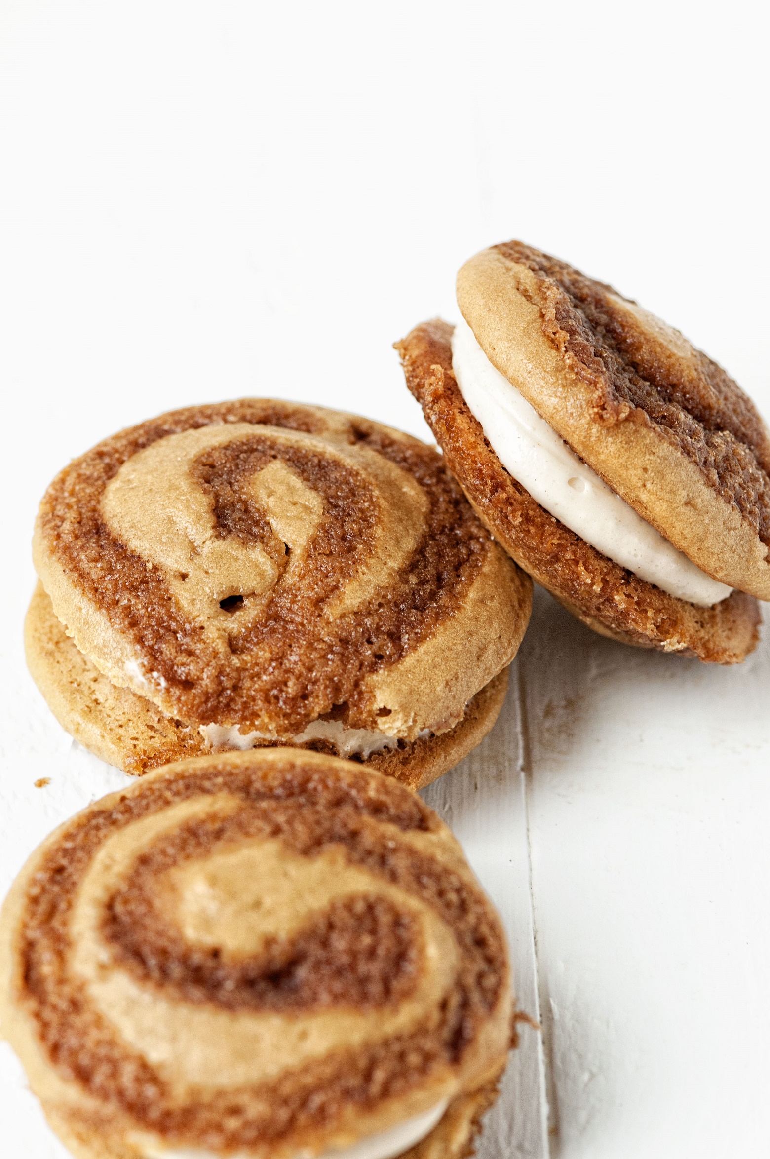 Cinnamon Roll Whoopie Pies with Cream Cheese Frosting