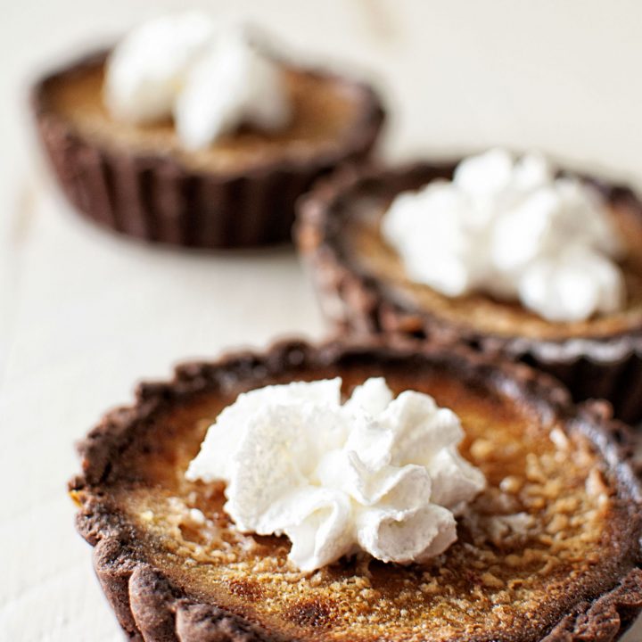 Pumpkin Creme Brûlée Tartlets with Chocolate Ginger Crust