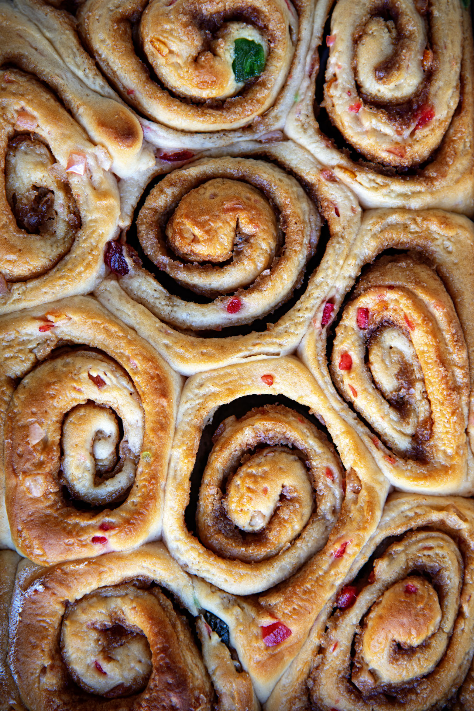 Bourbon Frosted Fruitcake Cinnamon Rolls