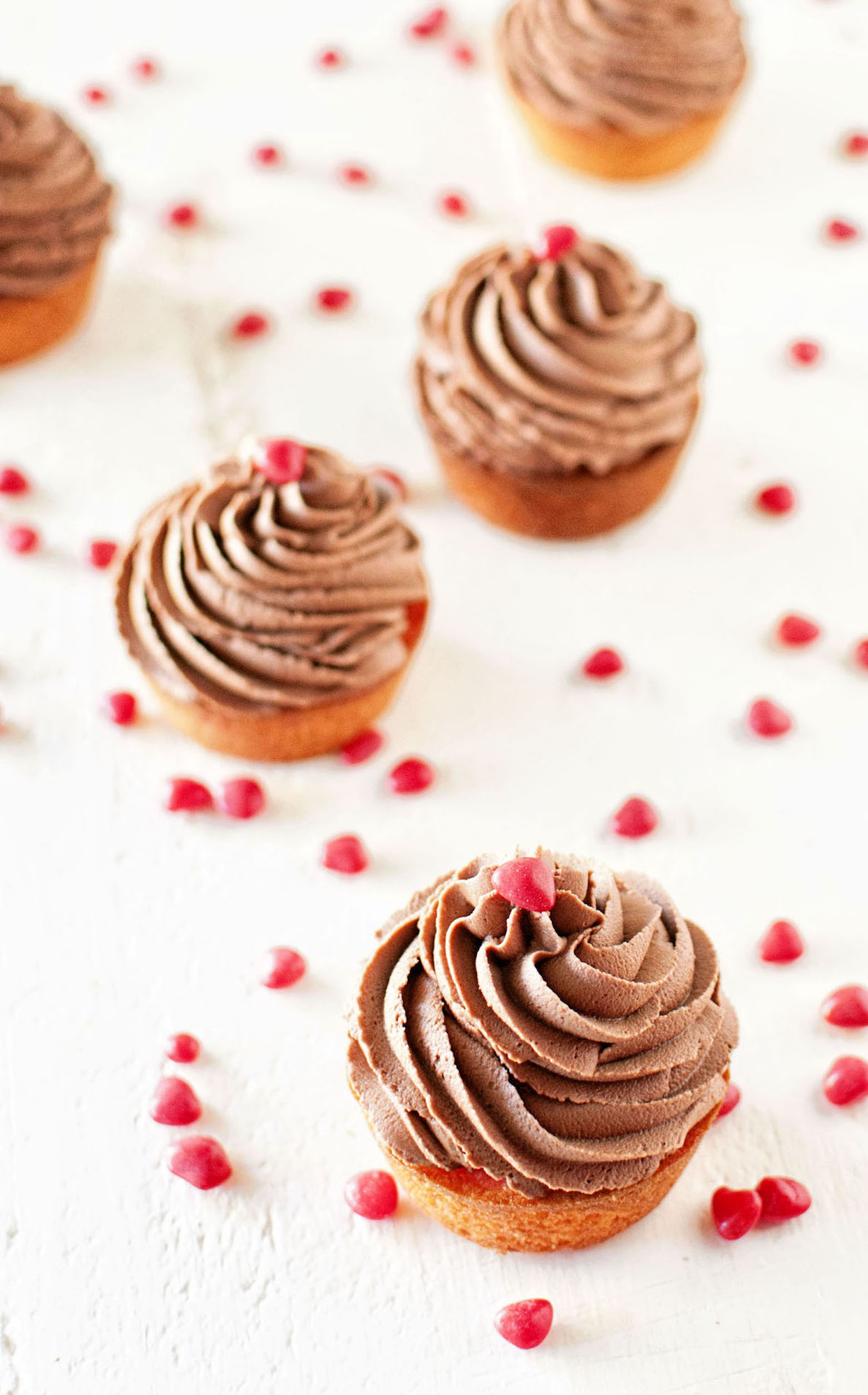 Cinnamon Red Hot Cupcakes with Fudge Frosting