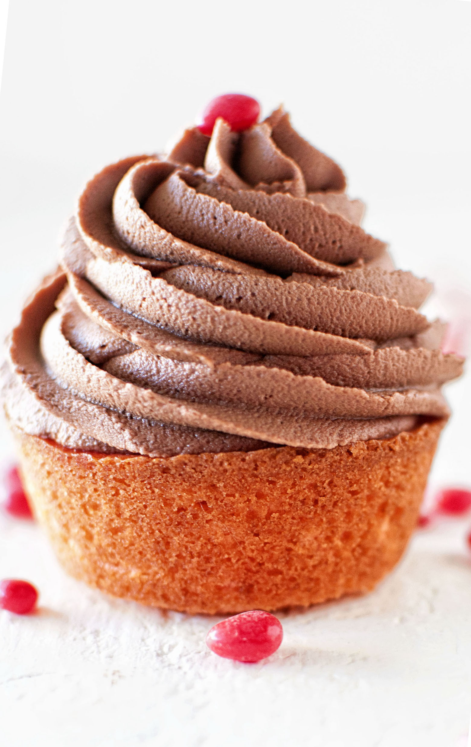 Cinnamon Red Hot Cupcakes with Fudge Frosting