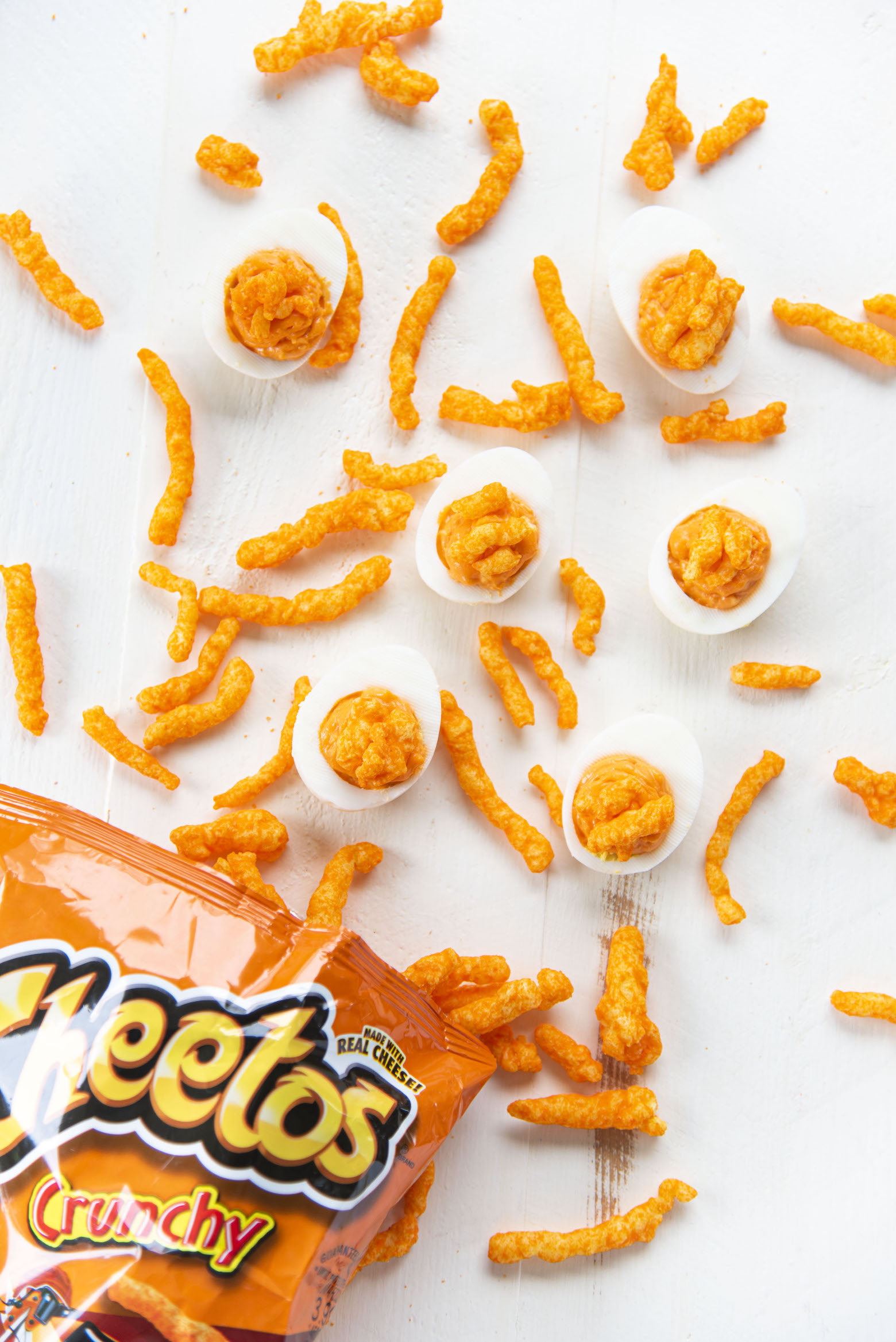 Cheetos Deviled Eggs coming out of Cheetos bag