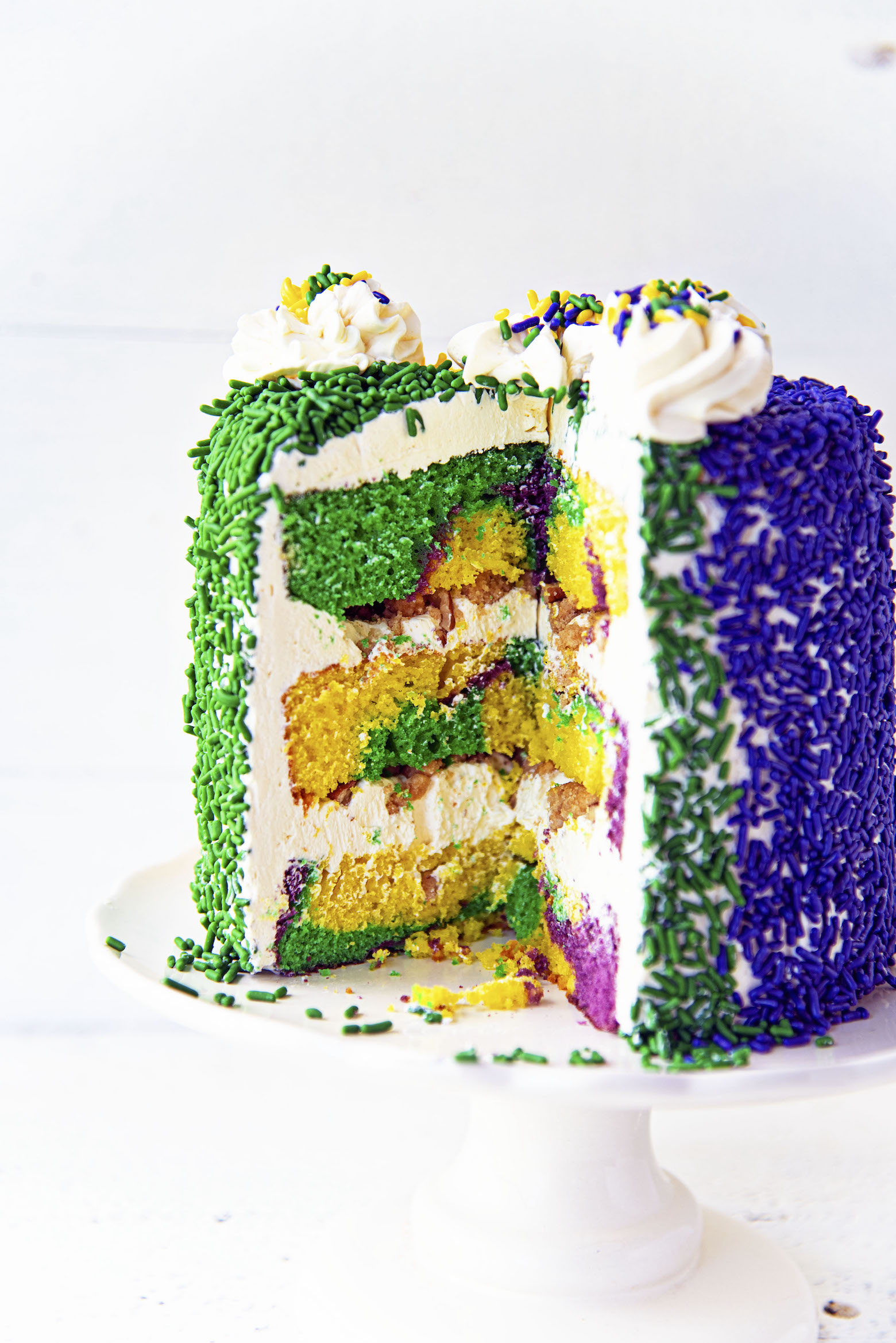 King Cake Layer Cake with cut view.