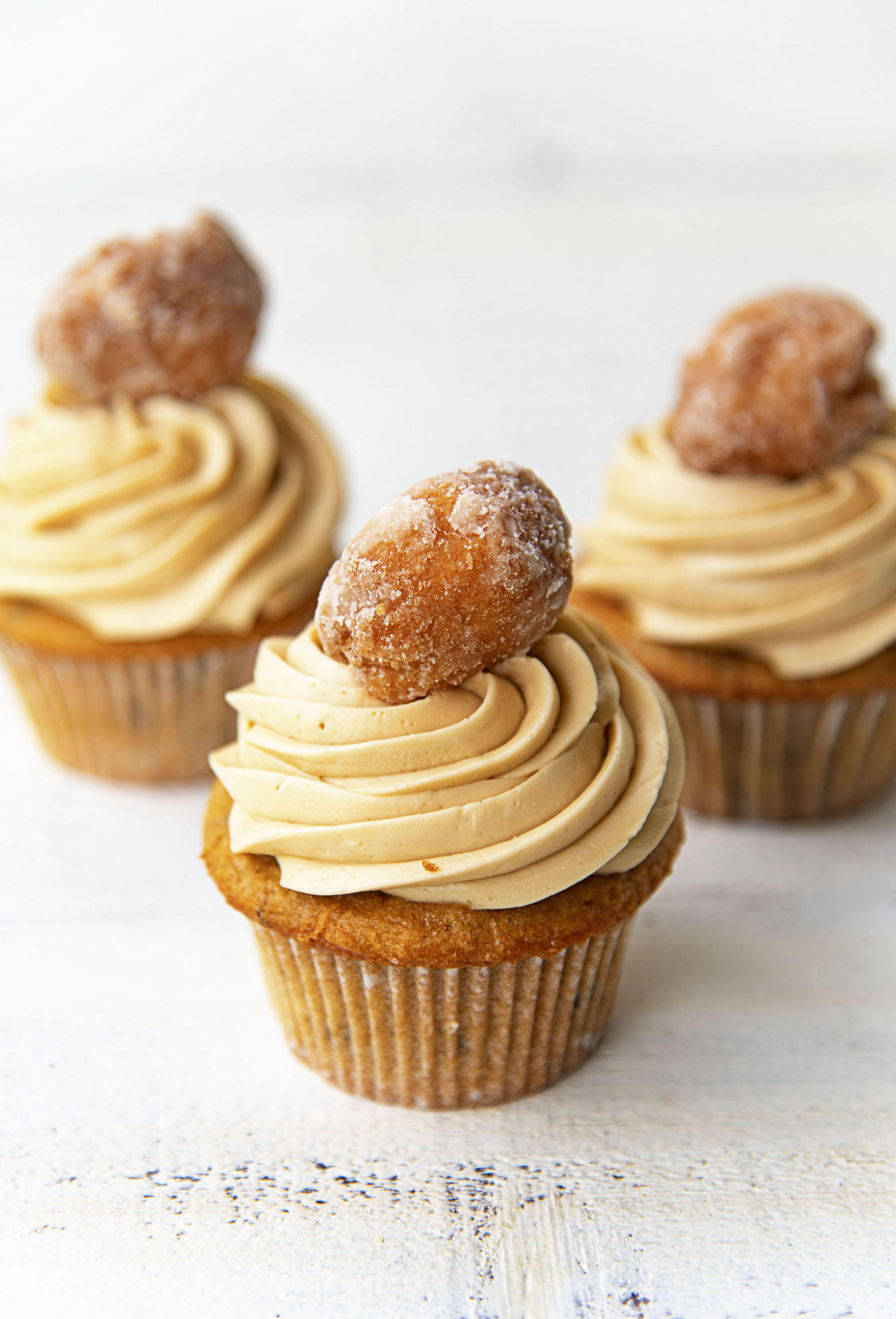 Side shot of Coffee Chocolate Chip and Glazed Donut Cupcakes