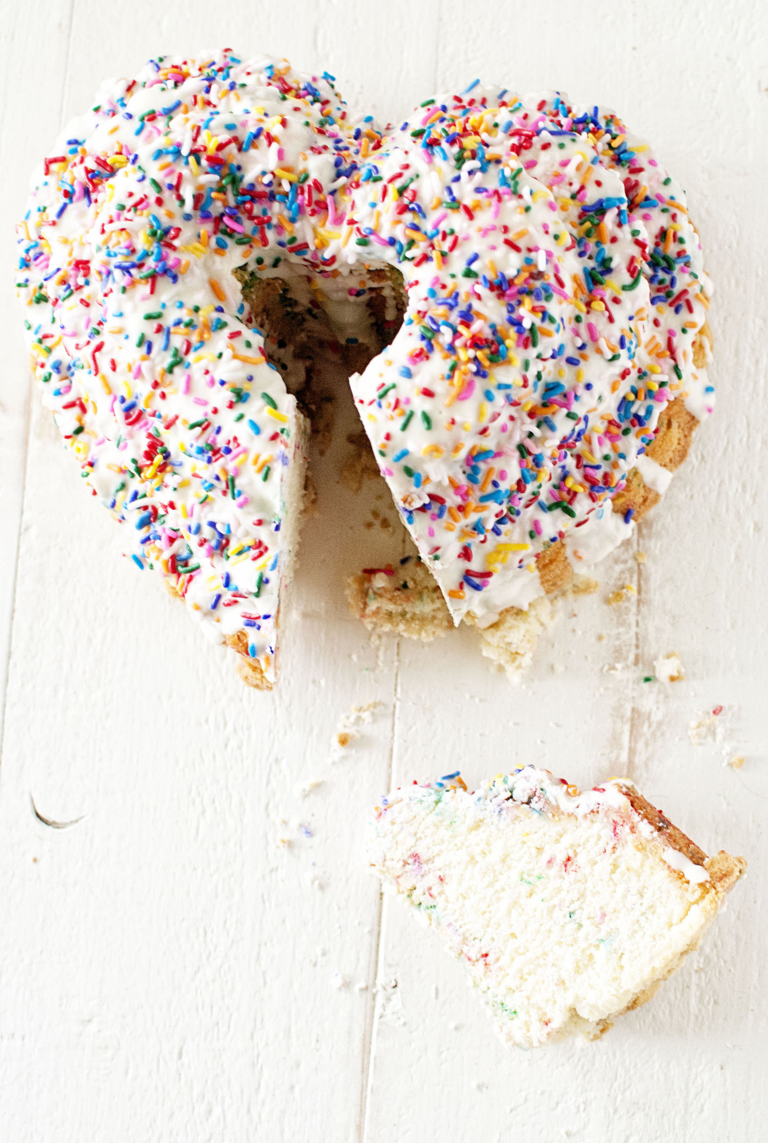 Overhead of pound cake with slice removed. 