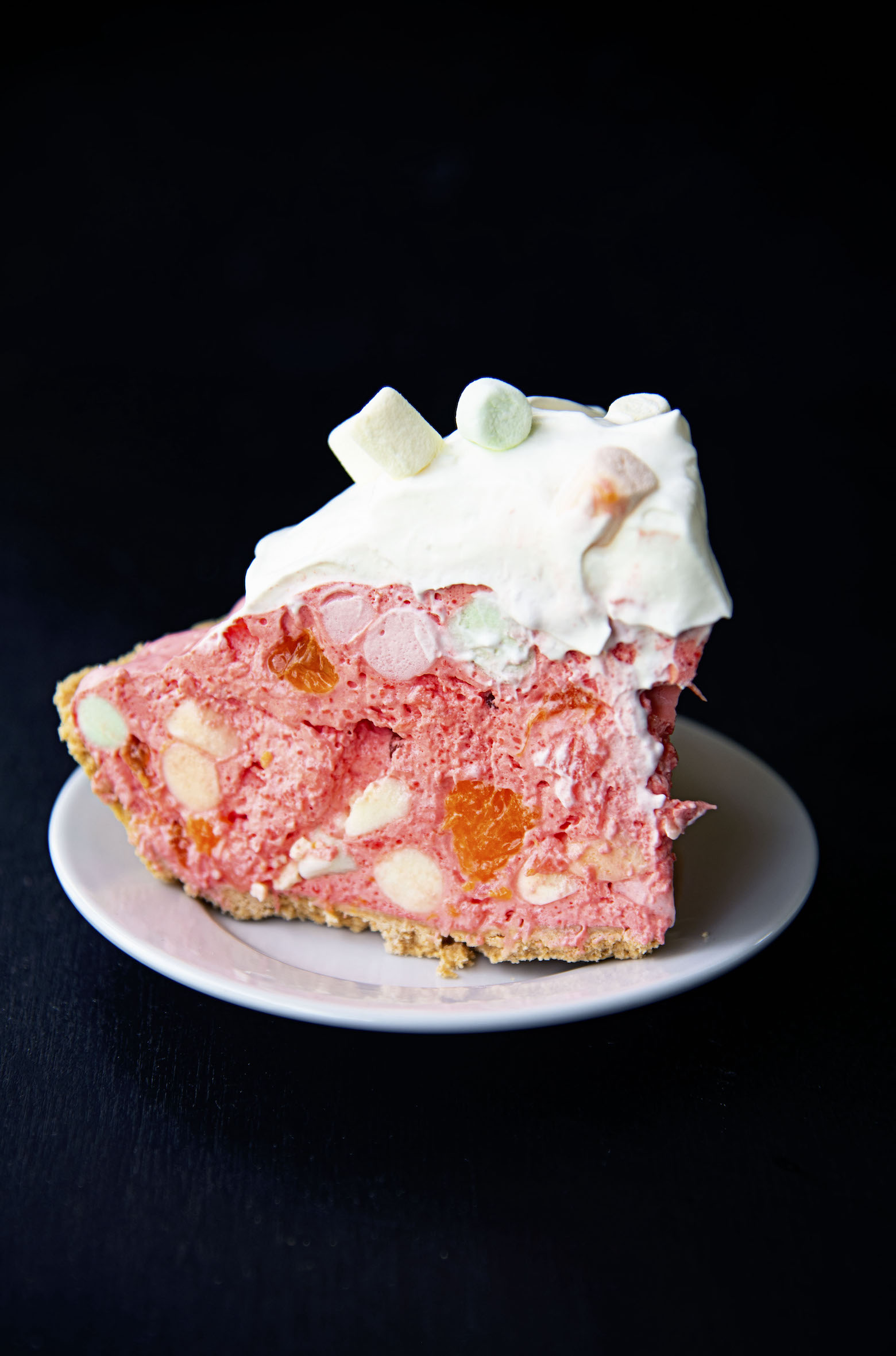 Single slice of Fruity Marshmallow Raspberry Jello Pie