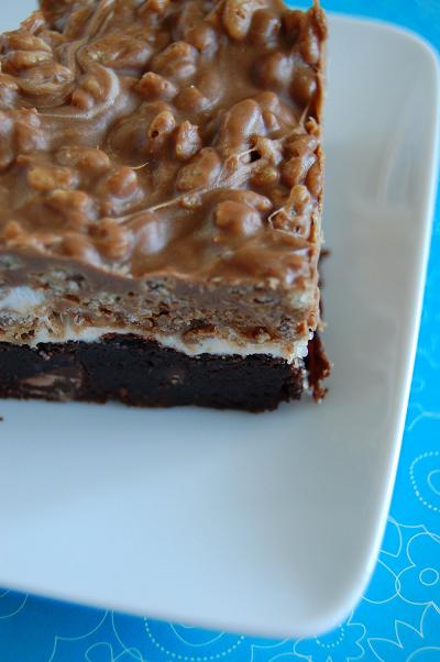 Three quarter view of marshmallow crunch brownie bars. 