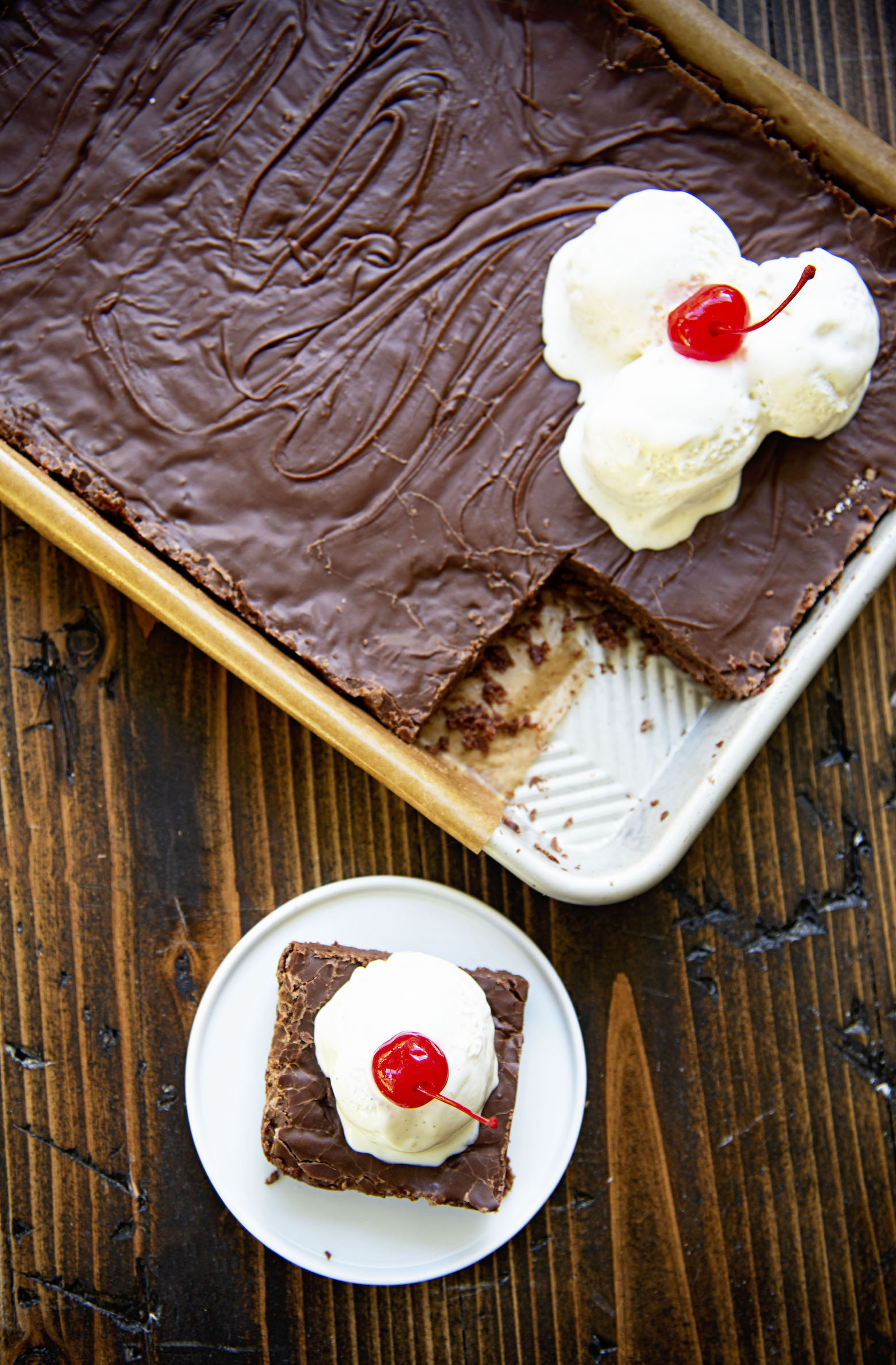 Overhead shot of Root Beer Float Texas Sheet Cake with piece cut out.