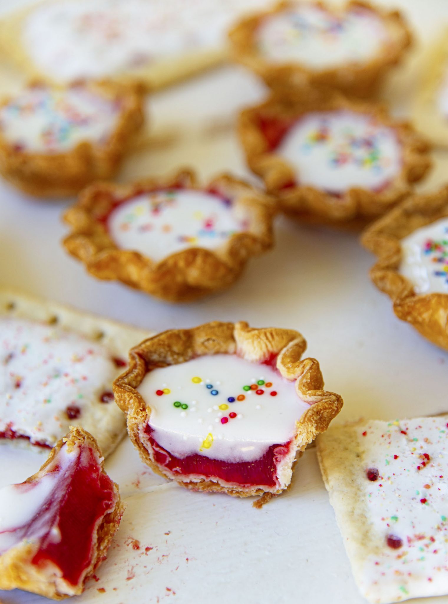 Strawberry Frosted Pop Tart Jello Shots with Icing and Sprinkles