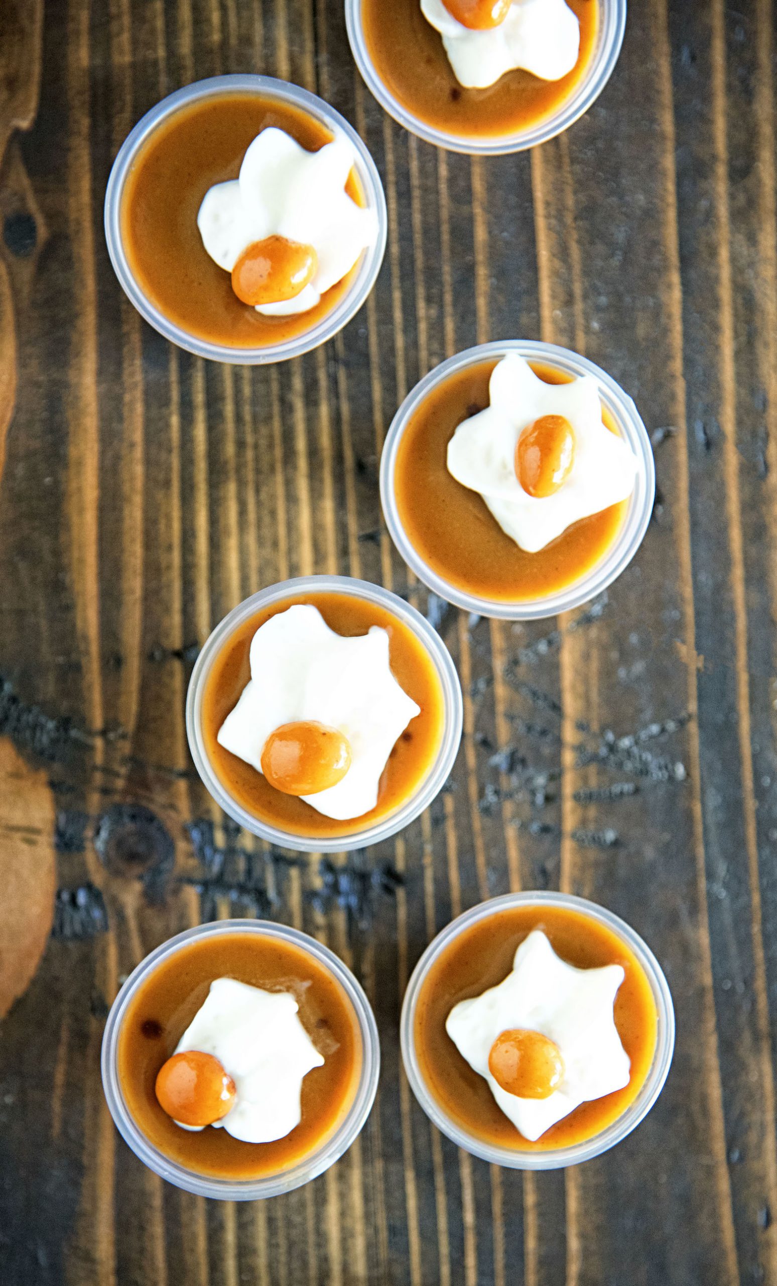 Overhead shot of pumpkin spice latte pudding shots. 