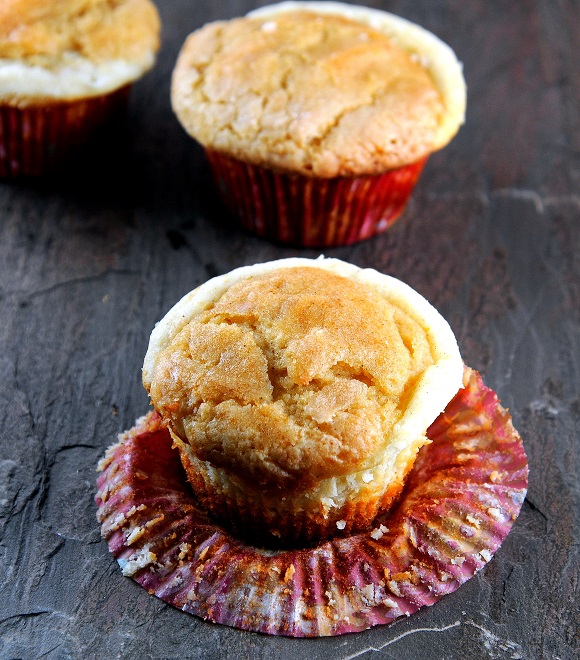Side view of Snickerdoodle Eggnog Cream Cheese Muffins. 