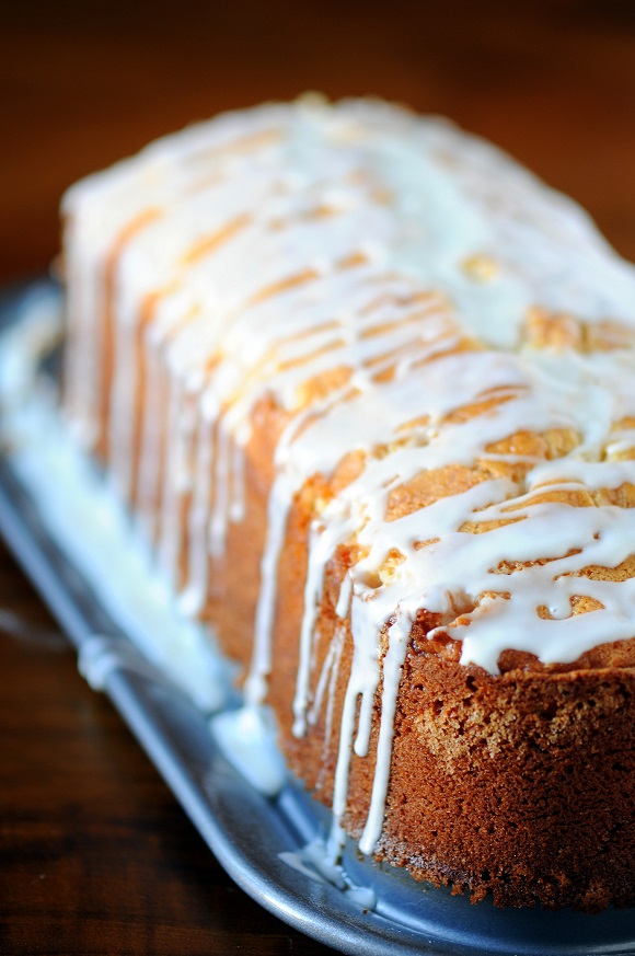 Side view of the cake with the icing dripping down. 