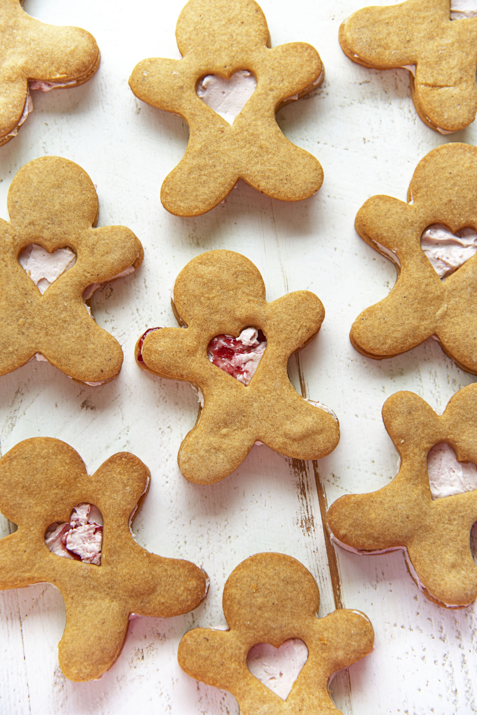 Overhead shot of Gingerbread Shortbread Sandwich Cookies scatter out. 