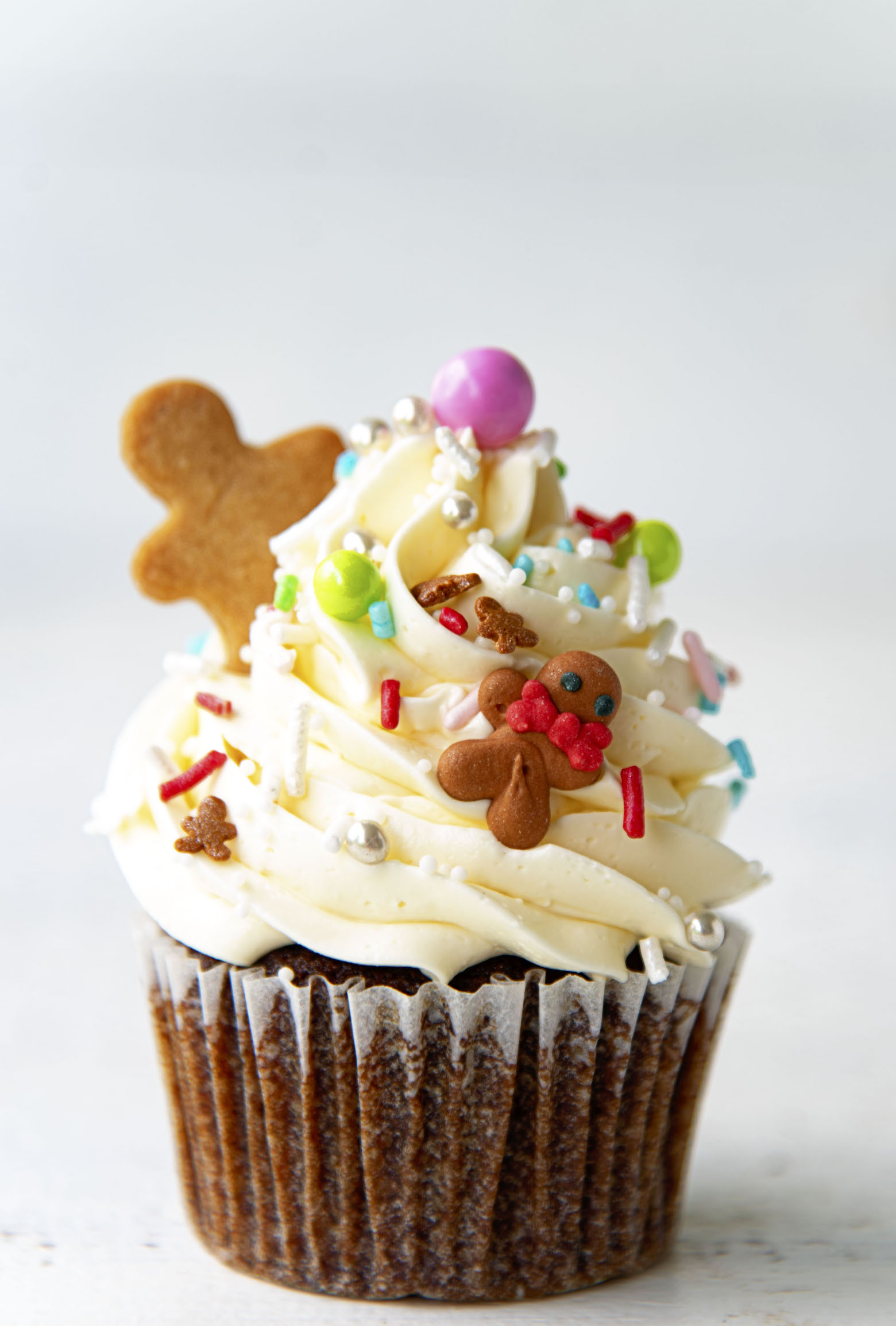 Up close shot of single Gingerbread White Chocolate Cupcake. 