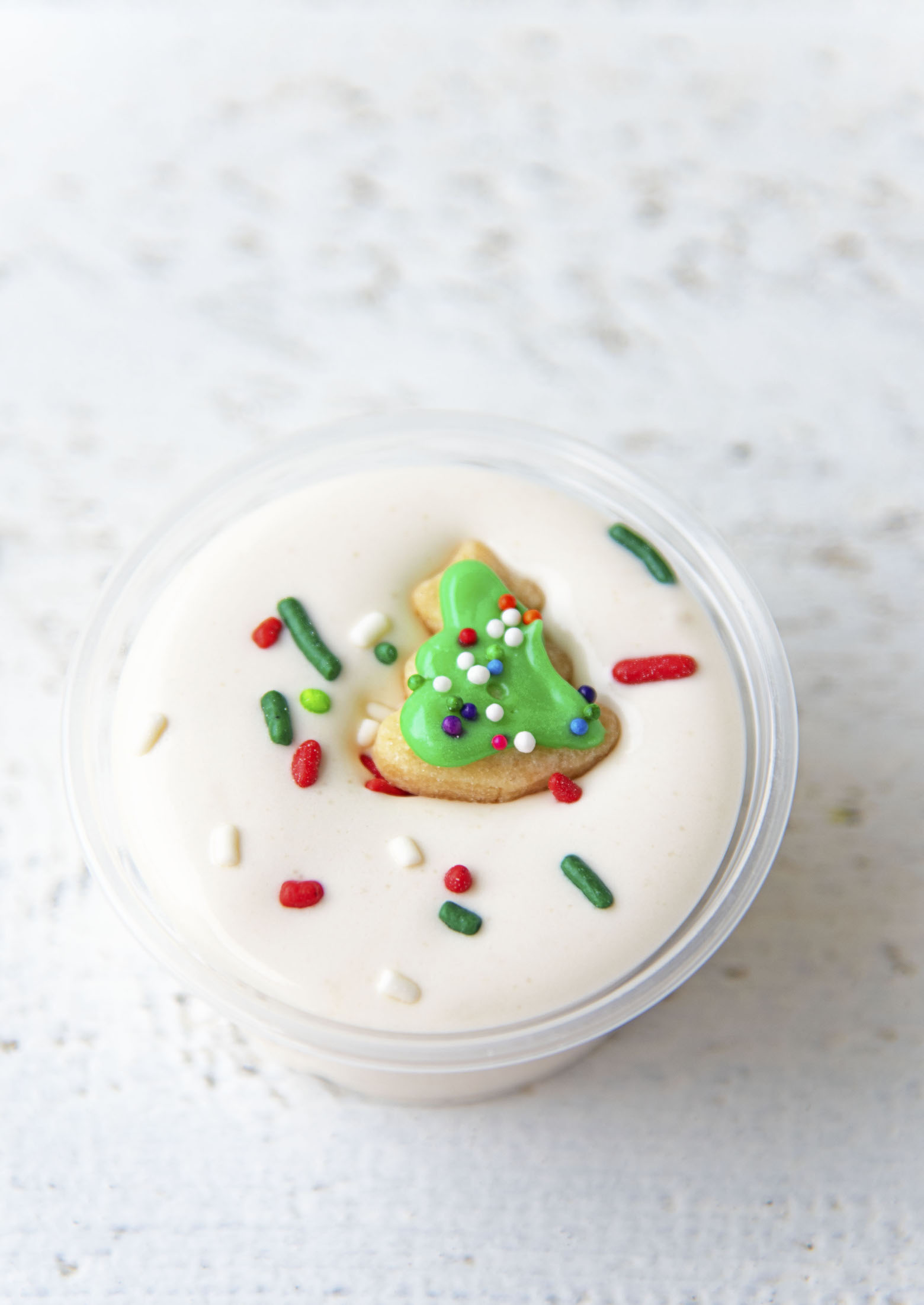 Close up of single Sugar Cookie Pudding Shot with mini cookie. 