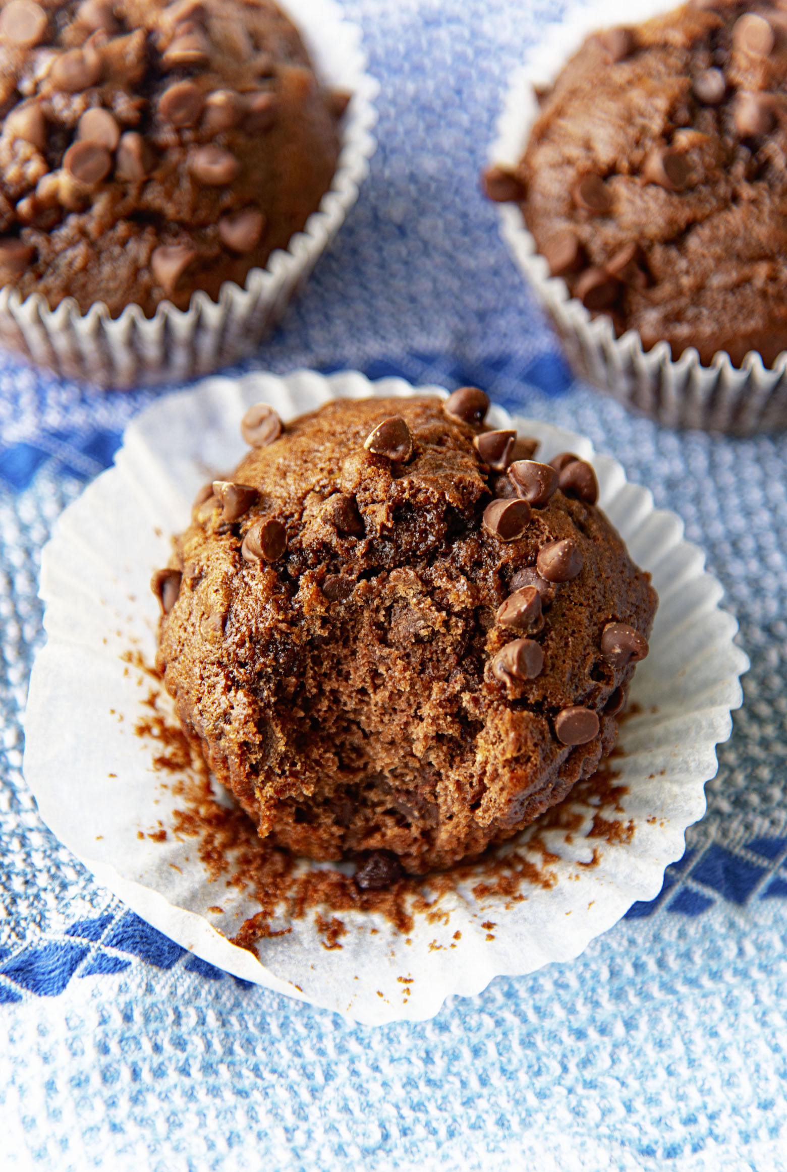 Double Chocolate Banana Muffin with bite taken out of it. 