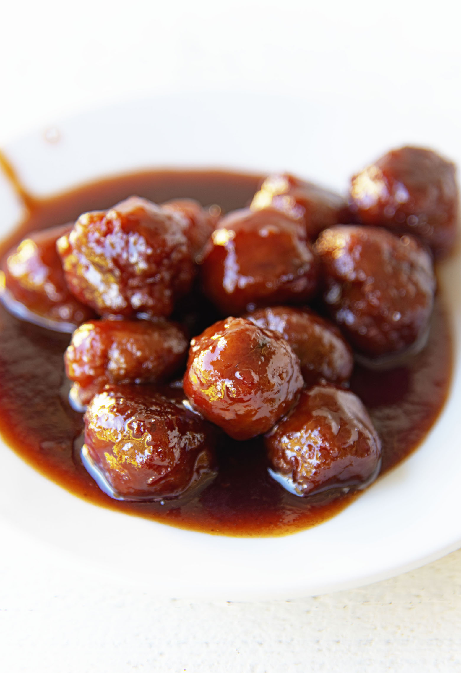 Close up of meatballs on an appetizer plate. 