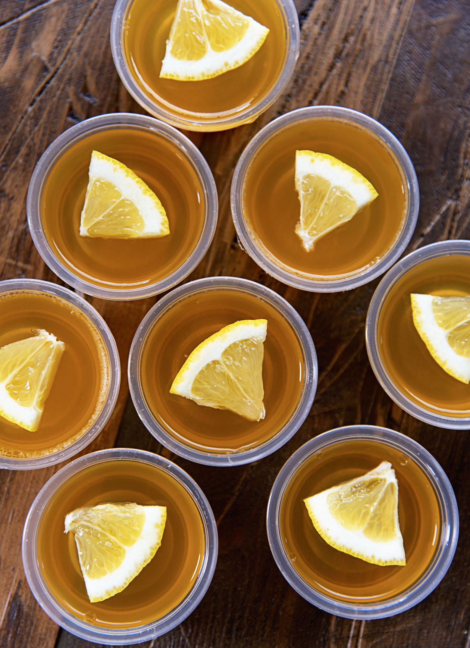Overhead shot of several Lynchburg Lemonade Jello Shots grouped together.