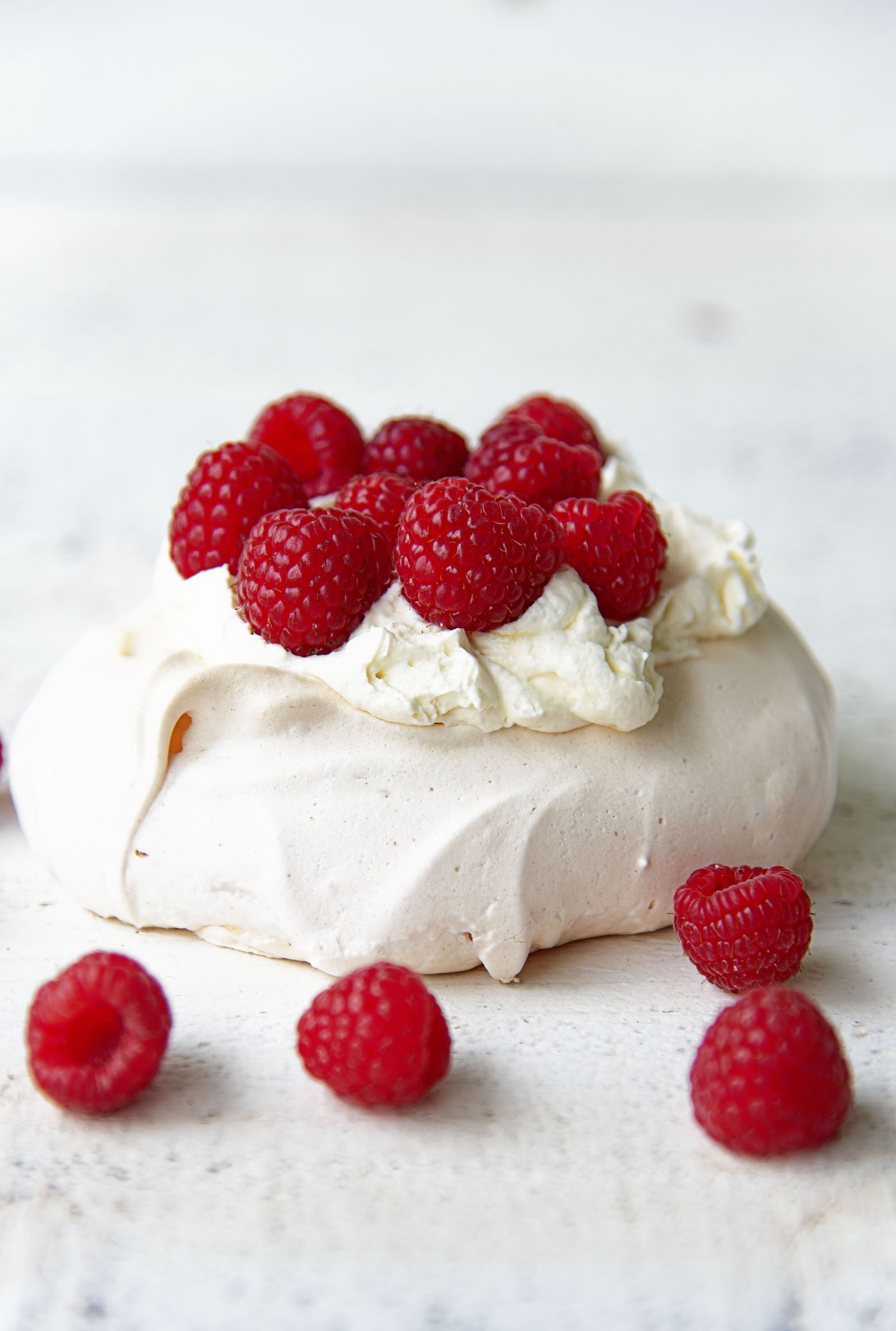 Side view of single Raspberry Lemon Elderflower Pavlova