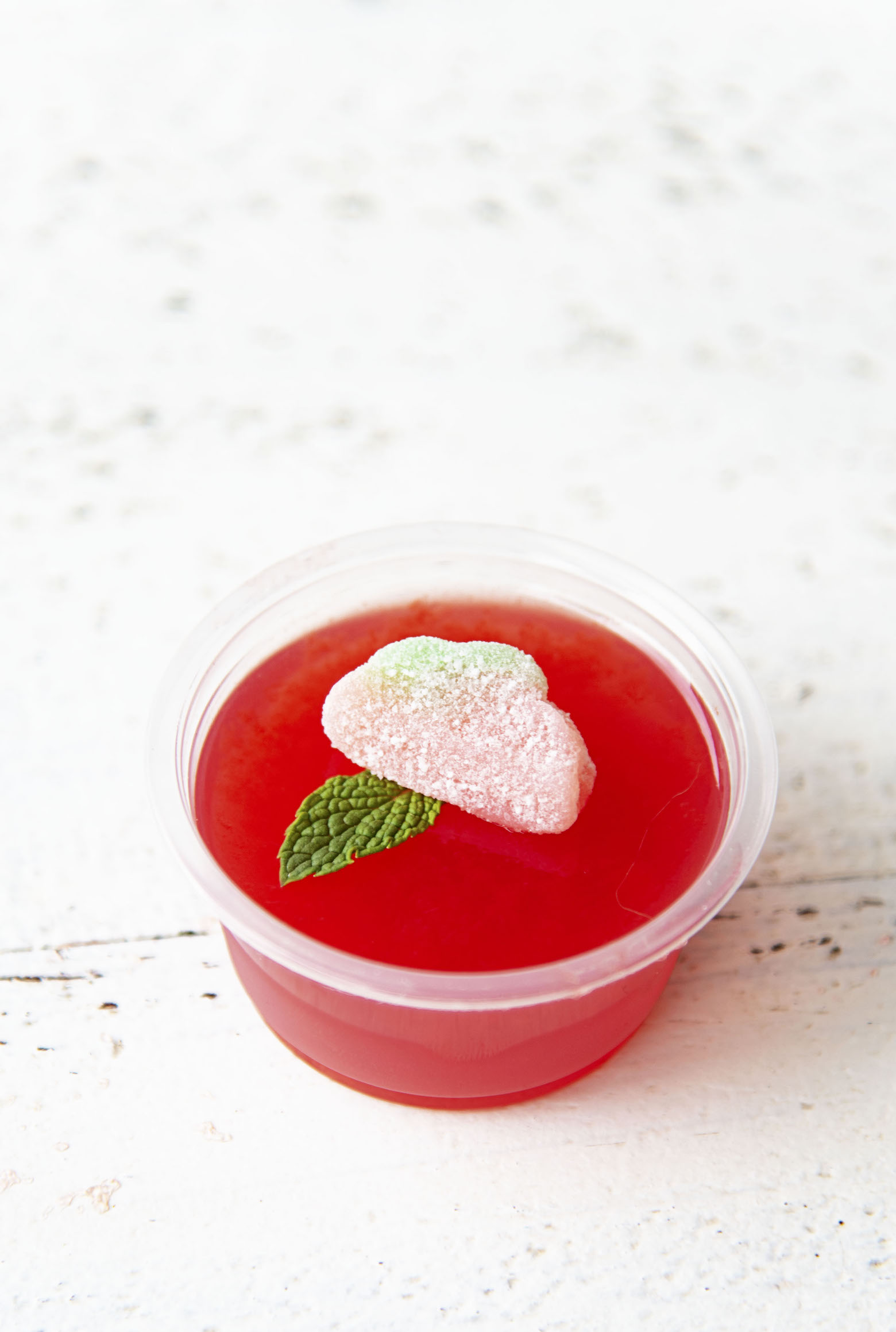 Single shot of Watermelon Mint Julep Jello Shot