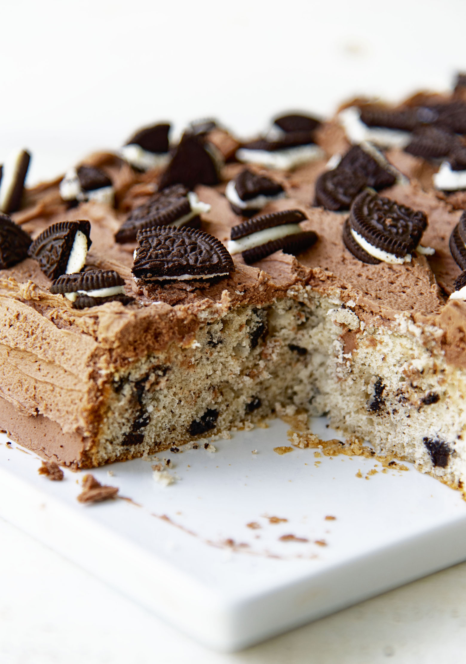 Side view of cut Cookies and Cream Cake