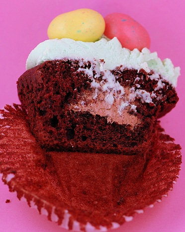 Peeps Easter Chocolate Cupcake with bit out of it exposing middle