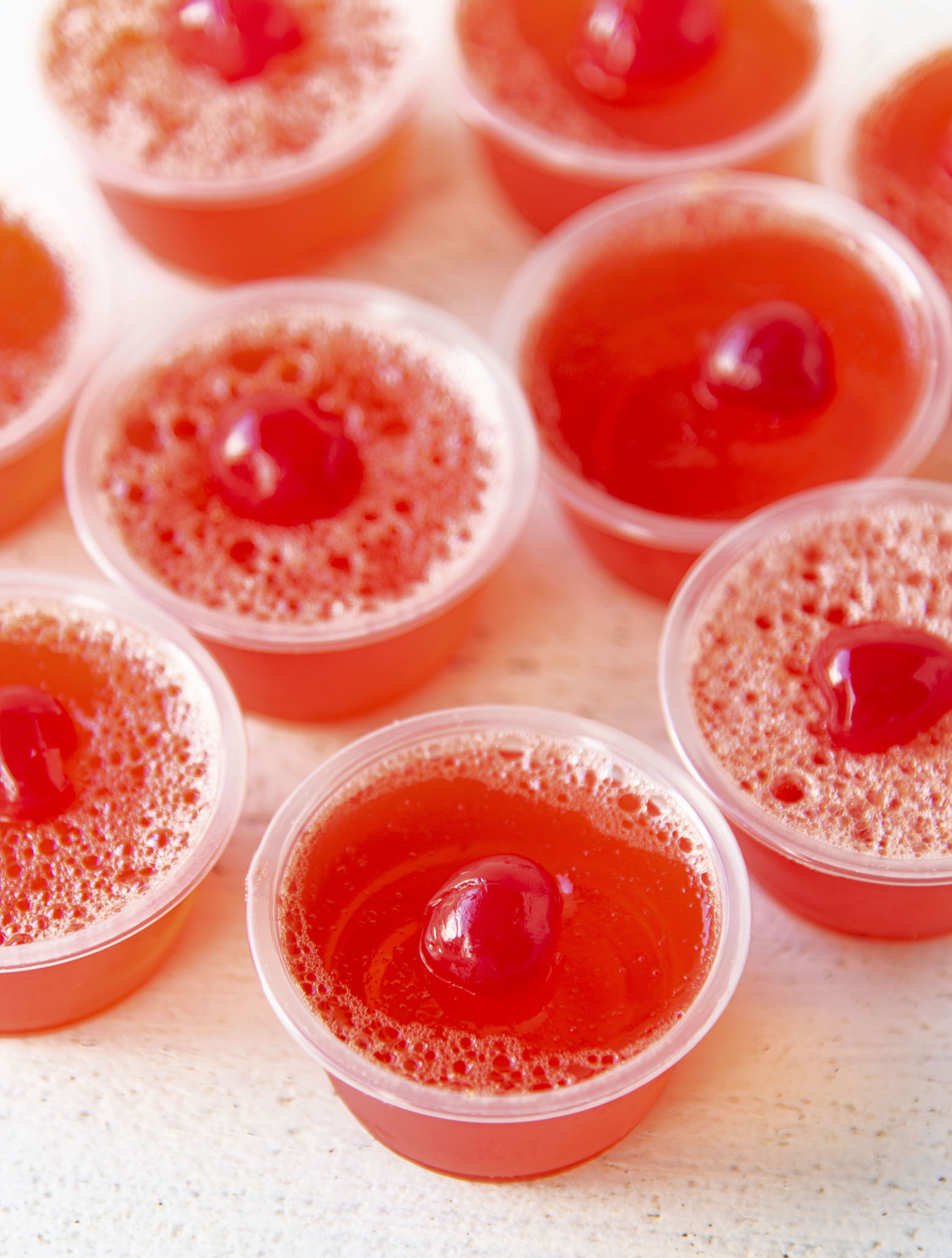 Three quarter view of a gathering of the jello shots.